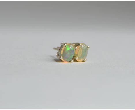 A pair of silver and Ethiopian opal studs, approximately 1.20ct