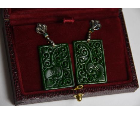 A pair of drop earrings set with rectangular patterned jade, emerald and diamonds