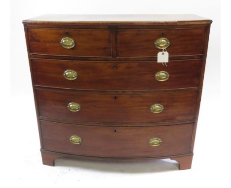 A George IV mahogany bow front chest of two short and three long graduated drawers on bracket supports, 100cm high, 108cm wid