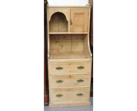 A late 19th/early 20th Century stripped pine kitchen dresser type cabinet having galleried top, open shelf beside cupboard, t