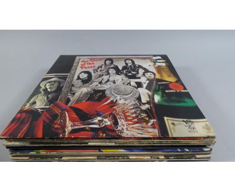 A Collection of Fourteen Mixed LP's Including The Faces, Rolling Stones, 10cc, Beatles, Moody Blues, Rod Stewart 