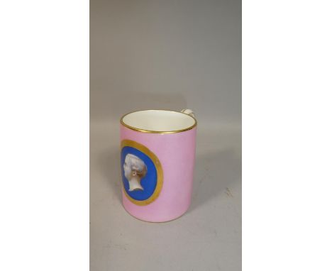 A 19th Century Pink Enamelled Mug with Centre Cartouche of Hand painted Side Portrait of Gent Set on Blue Enamelled Backgroun
