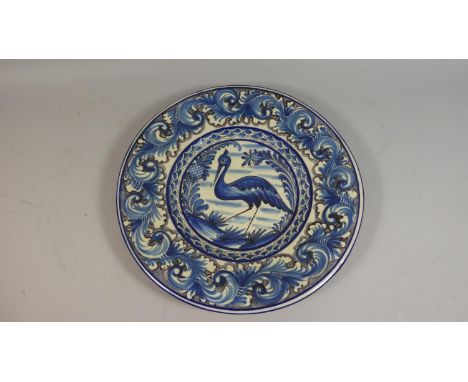 A Portuguese Ceramic Plaque Depicting Bird, 40cm Diameter 