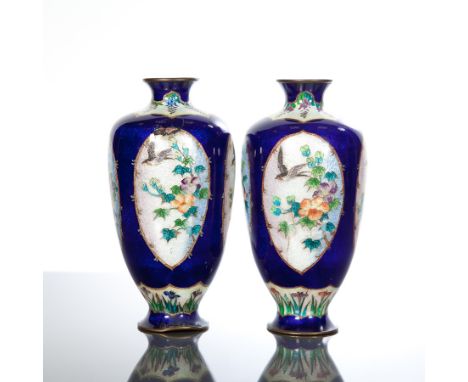 PAIR OF JAPANESE ENAMEL VASES
of baluster form and with panels of birds and foliate motifs, 19cm high 
