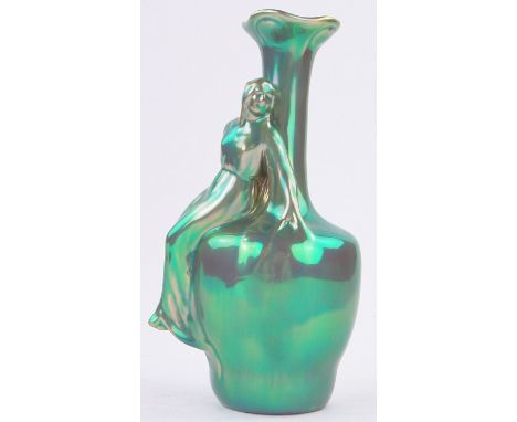 A Zsolnay Hungarian lustre pottery vase,surmounted by a Classical female figure, height 23cm.