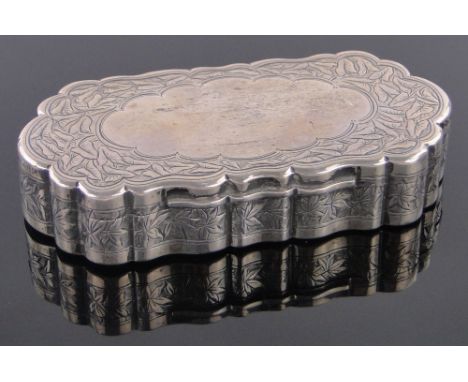 A Victorian silver snuff box of shaped oval form,engraved allover with vine leaves, by George Unite, Birmingham 1889, length 