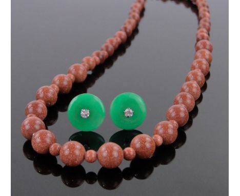 Pair of jade and diamond disc shaped earrings, 13mm across and a gold stone bead necklace.