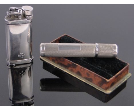 A Vintage Japanese silver mounted pocket lighter and an engine turned silver pocket lighter, (2).