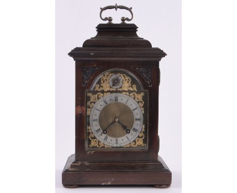 An Edwardian mahogany cased bracket clock,with brass arched and silvered dial and brass 8-day 2 train striking movement, heig