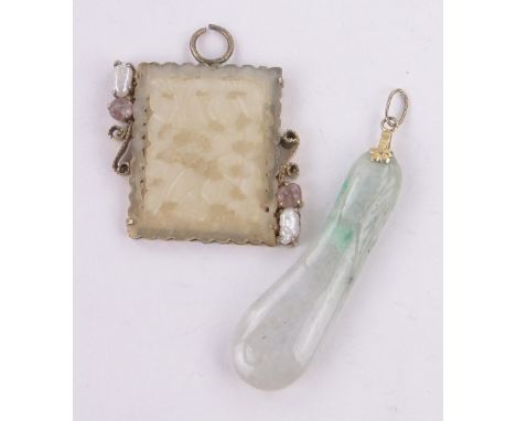 A Chinese carved and pierced jade panel pendant,unmarked setting, width 35mm and a Chinese engraved jade pendant, (2).