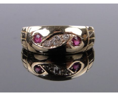 An 18ct gold ruby and diamond set ring,size I.