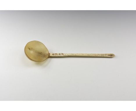 18th-19th century AD. A liturgical spoon comprising a horn bowl attached with brass pins to a bone handle with four large ann