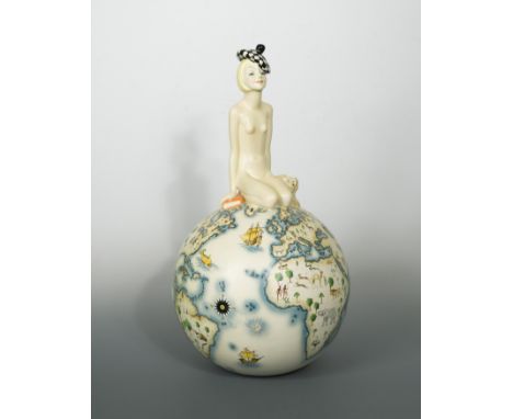 modelled as a young female nude seated beside a small dog on top of a globe, signed to the underside 'Lenci, Torino, Made in 