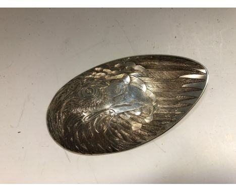 Edinburgh, 2013, the cast oval shaped reversible bowl engraved both sides with an eagle head and feathers, 0.80ozt, presented