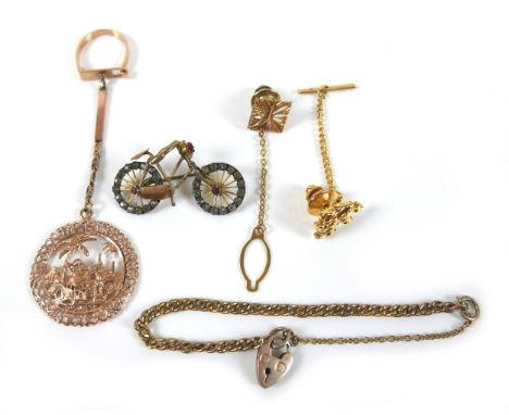 A 9ct yellow gold child's bracelet, 7.0g, together with an Eastern gold pendant on a gilt key ring, 9.0g, a gilt metal bicycl