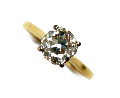 An 18ct yellow gold and diamond solitaire ring, the slightly oval faceted cut stone approximately 1.9ct, 7.7 by 7.4 by 5.0mm,