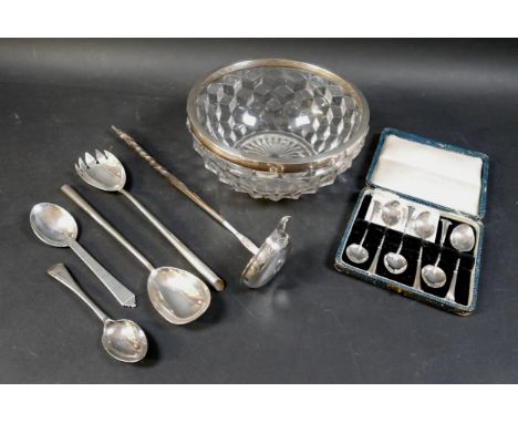 A Georg Jensen sterling silver spoon 16.5 cm long, a boxed set of six silver coffee spoons, a coin punch ladle, a pair of sil