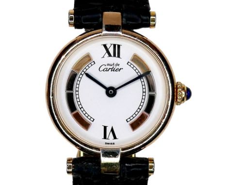 A vintage Must de Cartier lady's wristwatch, model 1851, silver gilt circular case, the white dial inset with coloured metal 