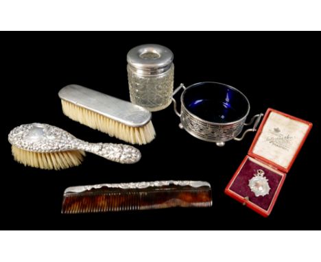 A collection of Edwardian and later silver, including a twin handled sugar bowl with blue glass liner, George Nathan & Ridley