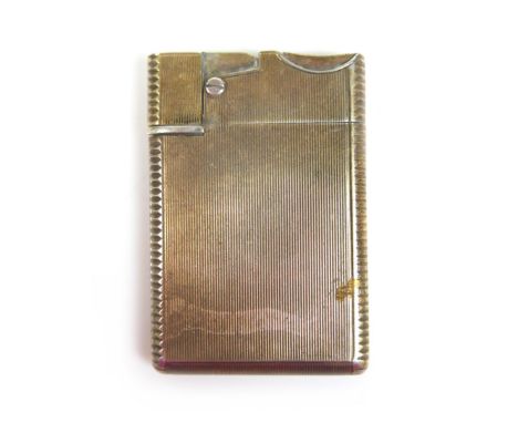 An Asprey and co Ltd silver wafer petrol lighter, London 1953/54, 37 by 58 by 6mm. Flick action works, no engraving generally