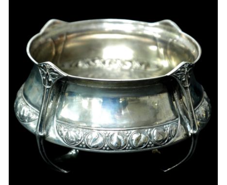 An Arts & Crafts silver bowl, with four handles, decorated with foliate designs, William Hair Haseler, Birmingham 1905, 16.5t