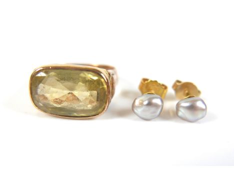 A pair of 14ct gold pearl earrings, 1.0g, together with and a gold citrine set ring tests to approximately 9ct gold, size I, 