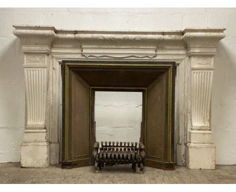 An early 20th century fire place, the white painted, shell carved and bolection moulded surround of Neoclassical design (H132