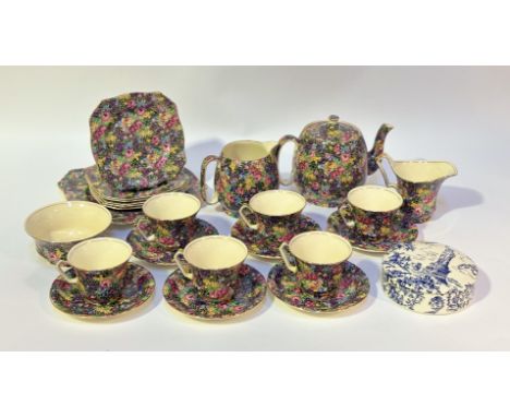 A Royal Winton China, "Hazel" pattern part tea service comprising, a teapot (h-16.5cm), six tea cups, a creamer (h-10cm), a m