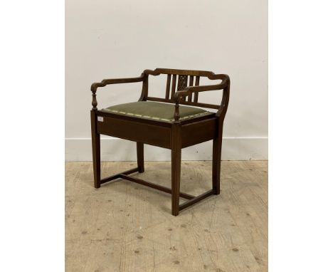 An Edwardian mahogany chair back piano stool, inlaid with figured walnut and boxwood stringing, the green velvet upholstered 