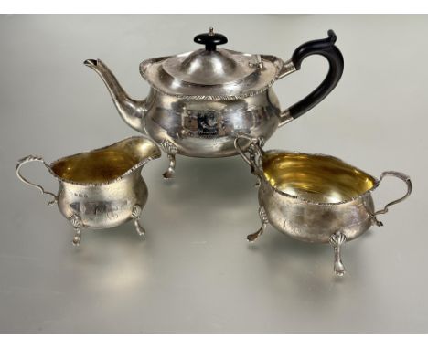 Leith Interest; a Birmingham silver gilt three piece tea service comprising tea pot with scalloped gadroon top and ebony hand