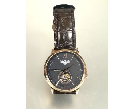 A German Elysee automatic gilt steel cased waterproof wrist watch with gray dial and baton hour markers and roman numeral at 