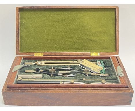 An inlaid wooden pencil case with W H Harling fitted instruments including compass etc... (w- 22.5cm)
