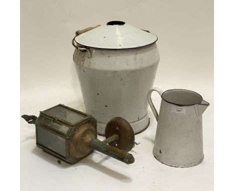 A Vintage blue and white enamel bucket with cover and swing handle (H33cm) together with a blue and white enamel 3 pint jug (