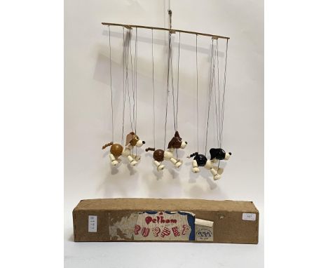 A 1950's vintage Pelham puppet, titled Wuff, Snuff, and Tuff, on a single control and within an original box.&nbsp;