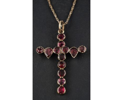An early 19th century, foil backed garnet, cruciform pendant, length (exl jump ring) ca. 3.6cm, weight ca. 2.1gms, together w