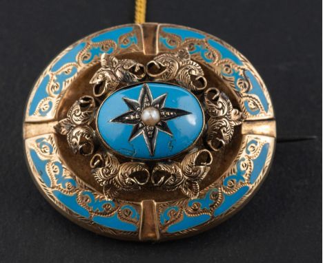 A Victorian, oval, light blue enamel and seed pearl locket brooch, with applied foliate decoration and glazed compartment to 