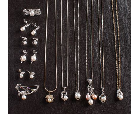 A collection of 'Cornwall Pearl' jewellery, including six pendants, two brooches and four pairs of earrings, with cultured pe