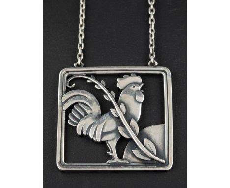 Arno Malinowski (1899-1976) for Georg Jensen, Denmark, an openwork, silver brooch depicting a cockerel, model nr 96, with mak