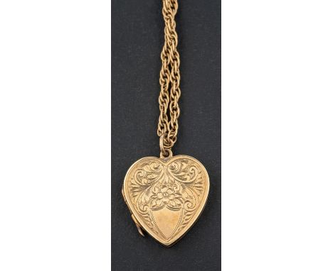 A heart-shaped locket pendant, with floral engraving and hallmarks for Birmingham, 1931, on a 9ct gold ropetwist chain, lengt