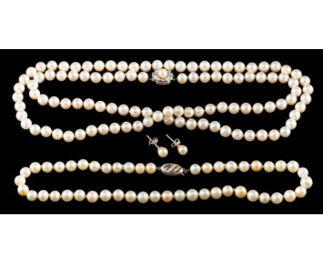 A cultured pearl necklace, the single strand  necklace composed of uniform 7mm cultured pearls, the clasp set with a cultured