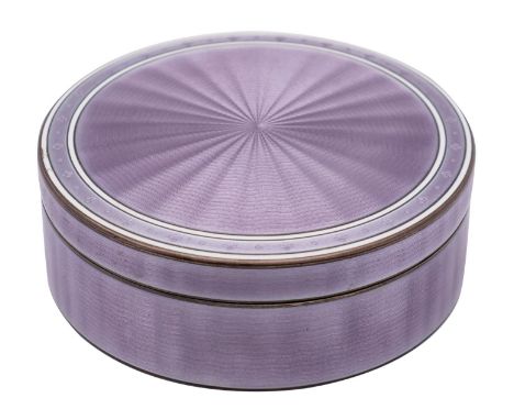 A George V silver gilt and enamel box dressing table box, bears import marks for J.J.H, London, 1919 of circular outline with