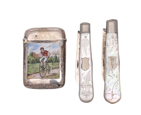 A Victorian silver and enamel vesta case, marks worn decorated with a figure of a cyclist on a penny farthing, 4.25cm high, t