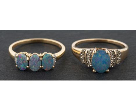 Two 9ct gold, opal triplet rings, including a three stone ring, flanked by three single-cut diamonds to each side, length of 