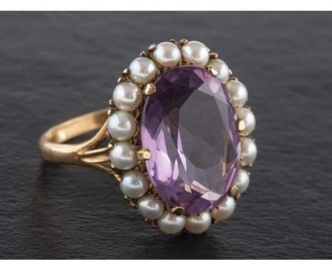 A 9ct gold, amethyst and cultured pearl cluster ring, estimated amethyst weight ca. 6.60cts, with hallmarks for London, 1977,