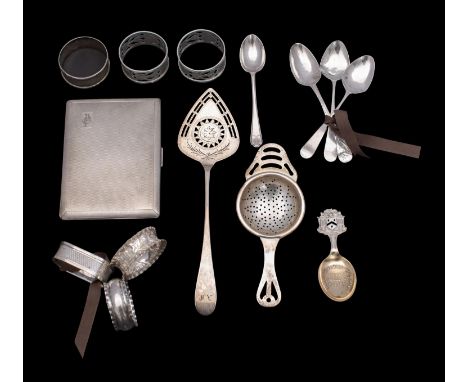 A mixed collection of silver wares, various makers and dates,  includes cigarette case, initialled, a tea strainer, napkin ri