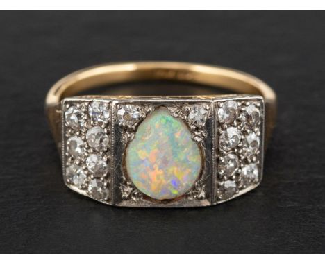 An oval, cabochon-cut opal and single-cut diamond cluster ring, estimated opal weight ca. 0.65ct, total estimated diamond wei