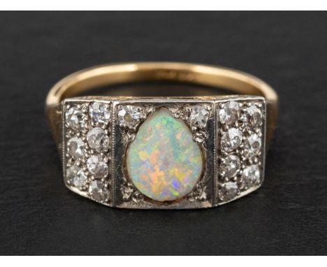 An oval, cabochon-cut opal and single-cut diamond cluster ring, estimated opal weight ca. 0.65ct, total estimated diamond wei