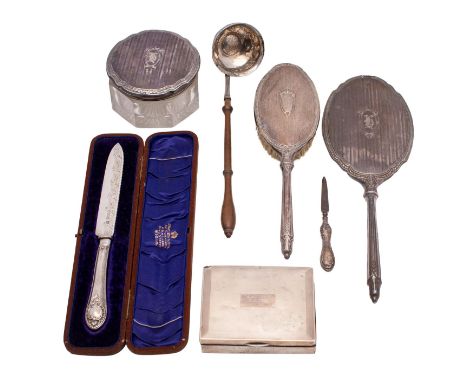 A mixed collection of silver wares, various makers and dates, includes hand mirror, hair brush, cigarette box, toddy ladle, c