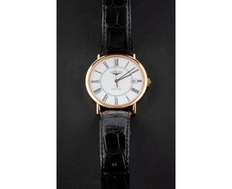 Longines, an 18ct gold gentleman's wristwatch the white dial having Roman numerals, date aperture, baton hands, a sweep secon