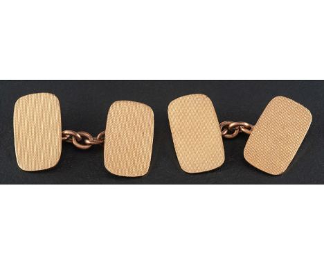 A pair of 9ct gold, rectangular cufflinks with engine-turned decoration, with hallmarks for Birmingham, 1937, length of cuffl